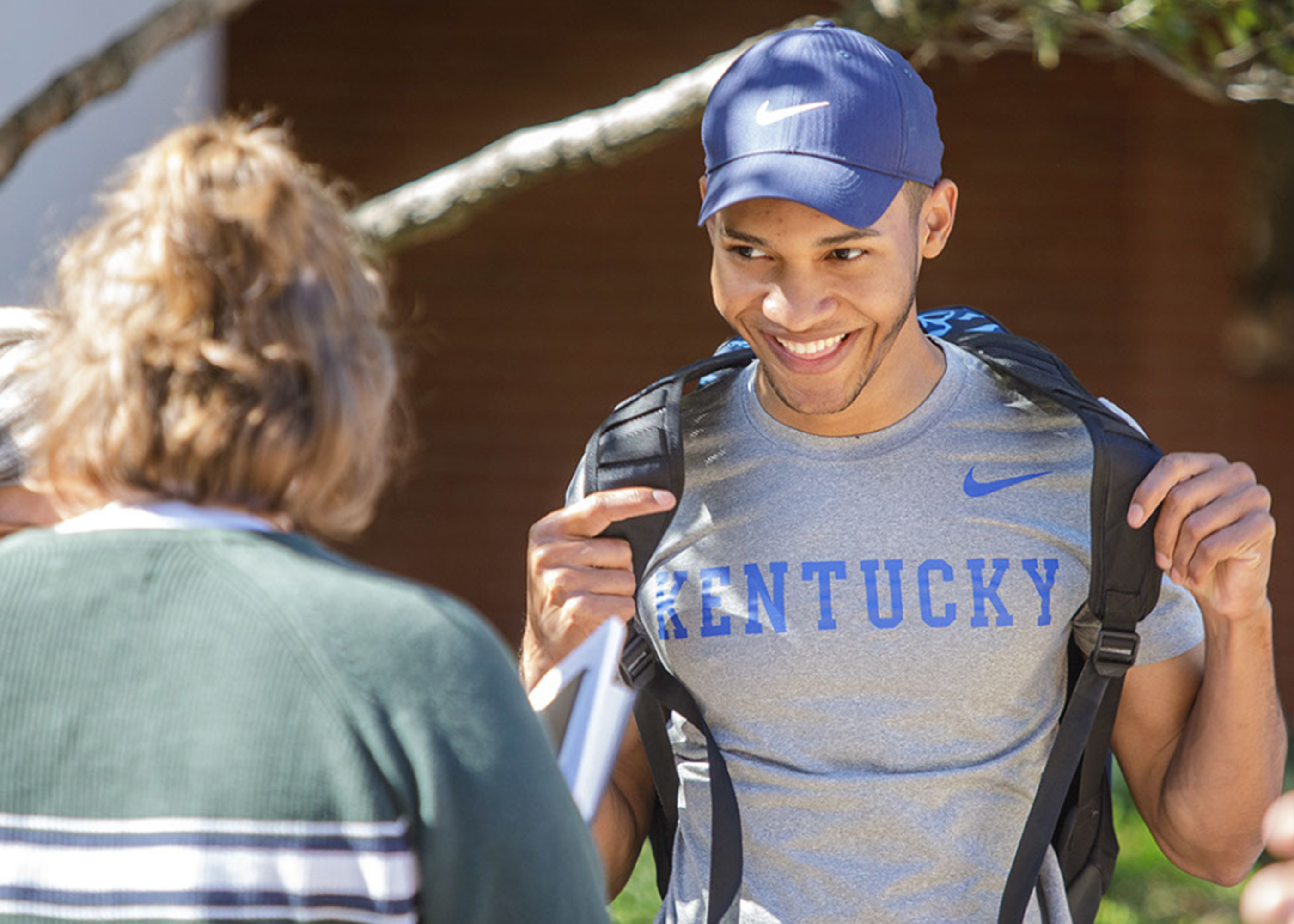photograph of smiling student wearing a Kentucky tee shirt.