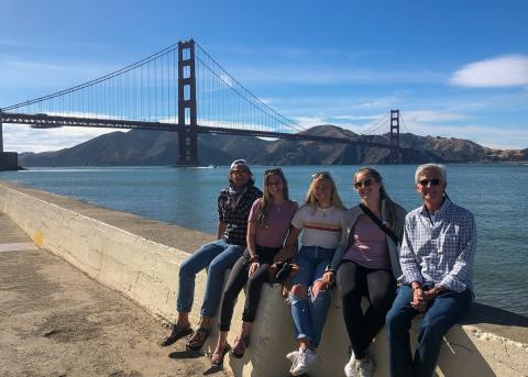 Photograph of students in San Francisco with the Golden Gate Bridge in the background